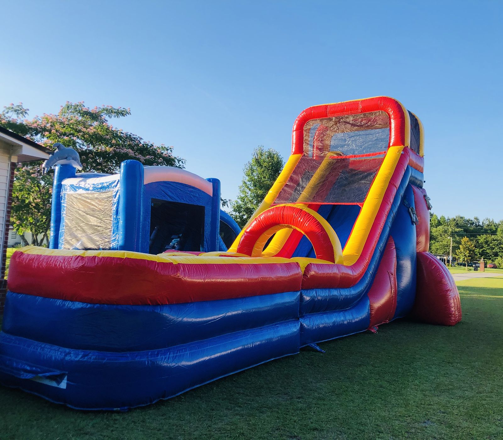 Tall red, yellow, and blue Rainbow Mega wet and dry water slide
